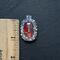 Pendant is approx. 1 inch long and 1/2 wide. 